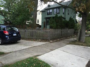Adjusting Fencing, Removing Overgrown Plants, and Adding Landscaping: Before