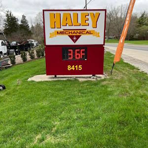 Adding Mulched Bed Around Haley Mechanical Sign: Before