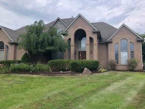 Removing and Replacing Overgrown Landscaping Around House Walkway: After
