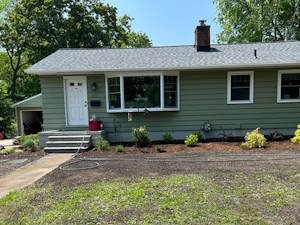 Removing and Replacing Overgrown Landscaping Around House: After