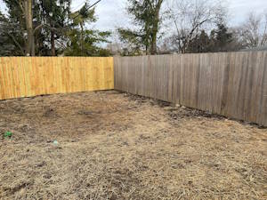 Adding a Landscaped Rock Bed Next to Fences: Before